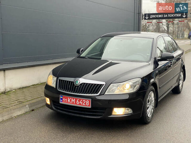 Чорний Шкода Октавія, об'ємом двигуна 1.6 л та пробігом 183 тис. км за 7999 $, фото 26 на Automoto.ua
