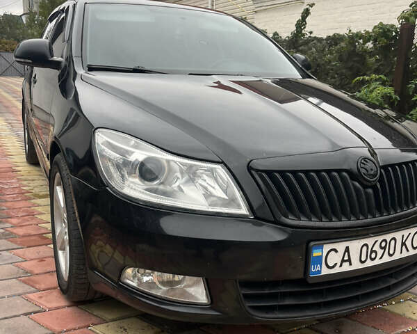 Шкода Октавія 2012 у Тальном на Automoto.ua Чорний Шкода Октавія, об'ємом двигуна 1.8 л та пробігом 325 тис. км за 7300 $, фото 6 на Automoto.ua
