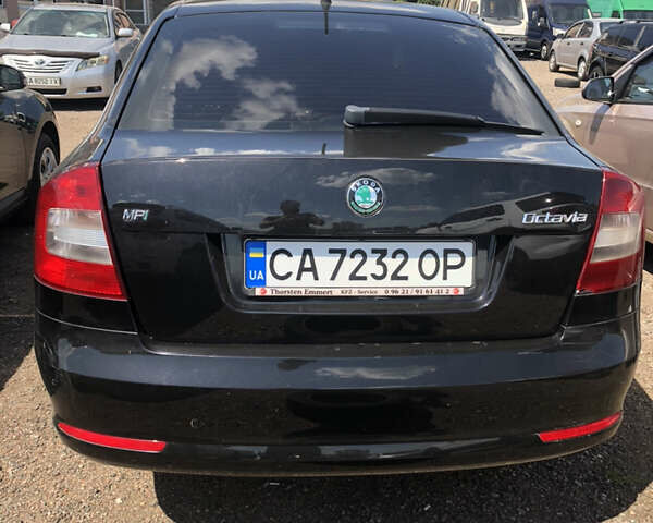 Черный Шкода Октавия, объемом двигателя 1.6 л и пробегом 236 тыс. км за 8500 $, фото 1 на Automoto.ua