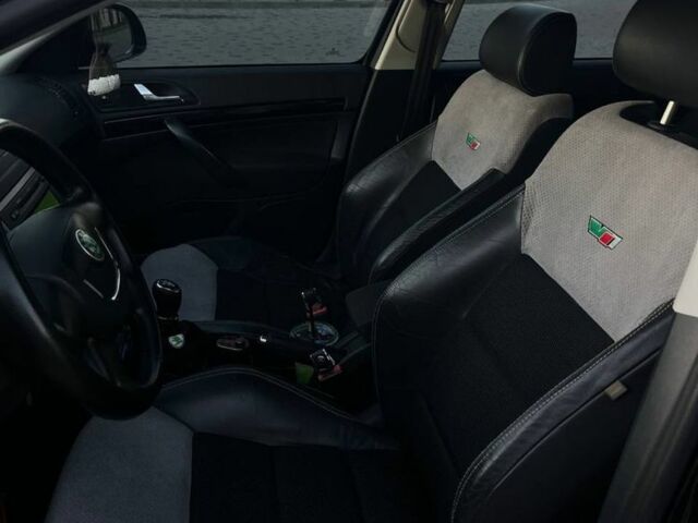 Черный Шкода Октавия, объемом двигателя 1.8 л и пробегом 266 тыс. км за 7500 $, фото 7 на Automoto.ua