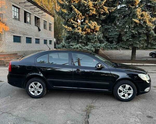 Черный Шкода Октавия, объемом двигателя 1.4 л и пробегом 232 тыс. км за 7500 $, фото 3 на Automoto.ua