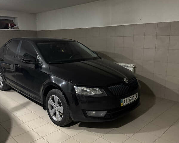 Черный Шкода Октавия, объемом двигателя 1.4 л и пробегом 186 тыс. км за 10000 $, фото 1 на Automoto.ua