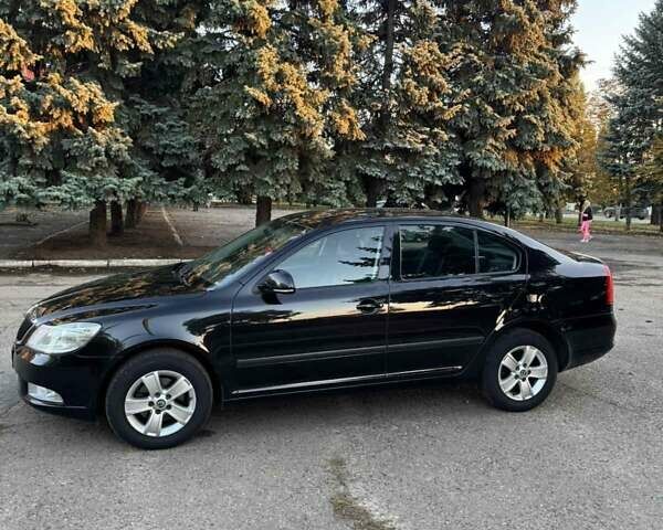 Черный Шкода Октавия, объемом двигателя 1.4 л и пробегом 232 тыс. км за 7500 $, фото 2 на Automoto.ua