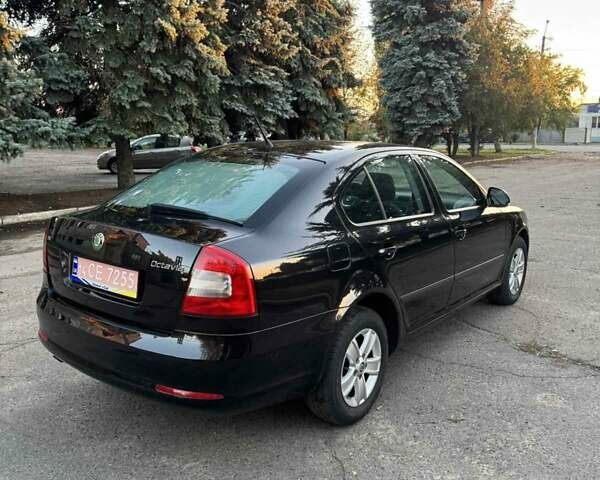 Черный Шкода Октавия, объемом двигателя 1.4 л и пробегом 232 тыс. км за 7500 $, фото 4 на Automoto.ua