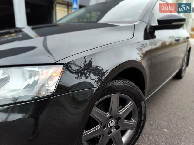 Черный Шкода Октавия, объемом двигателя 1.4 л и пробегом 252 тыс. км за 9990 $, фото 2 на Automoto.ua