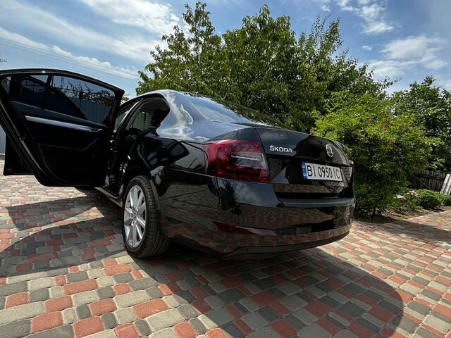Черный Шкода Октавия, объемом двигателя 2 л и пробегом 305 тыс. км за 14000 $, фото 2 на Automoto.ua