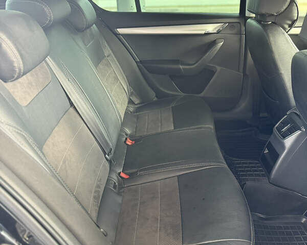 Чорний Шкода Октавія, об'ємом двигуна 1.6 л та пробігом 216 тис. км за 12499 $, фото 9 на Automoto.ua