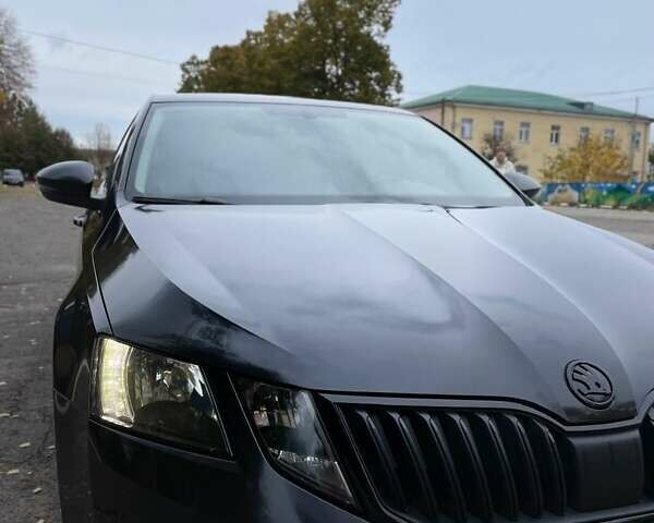Черный Шкода Октавия, объемом двигателя 1.8 л и пробегом 74 тыс. км за 16999 $, фото 12 на Automoto.ua
