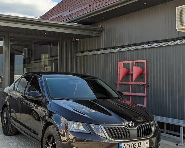 Черный Шкода Октавия, объемом двигателя 1.4 л и пробегом 130 тыс. км за 15500 $, фото 1 на Automoto.ua