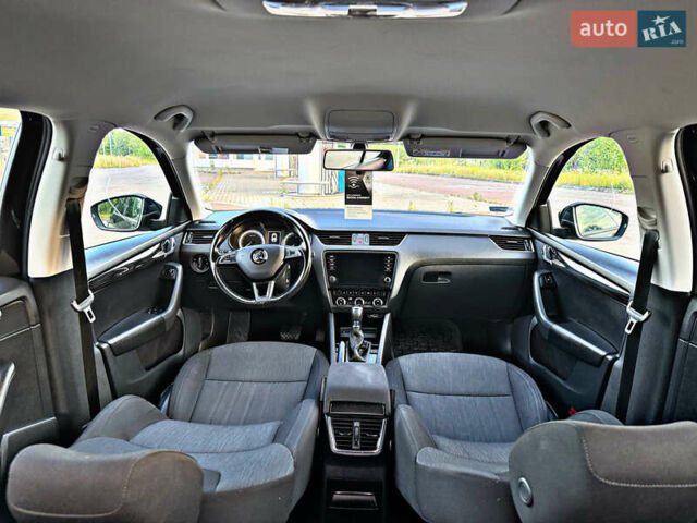 Черный Шкода Октавия, объемом двигателя 2.01 л и пробегом 165 тыс. км за 18550 $, фото 74 на Automoto.ua