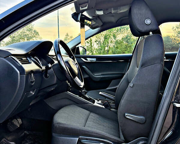 Черный Шкода Октавия, объемом двигателя 2.01 л и пробегом 165 тыс. км за 18550 $, фото 58 на Automoto.ua