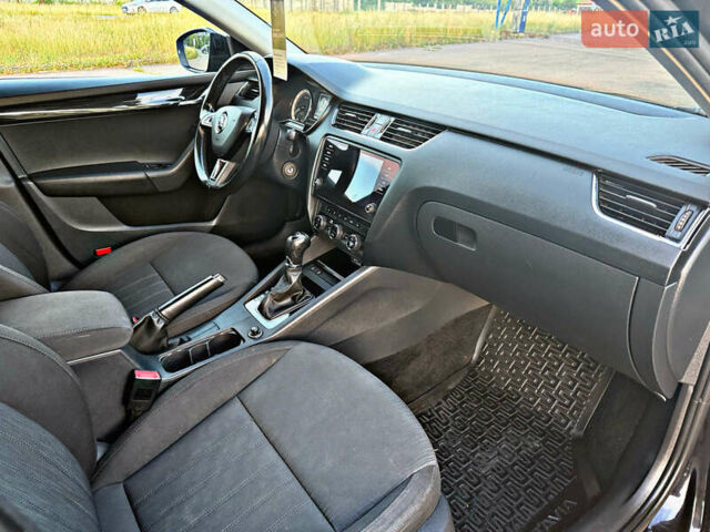 Черный Шкода Октавия, объемом двигателя 2.01 л и пробегом 165 тыс. км за 18550 $, фото 55 на Automoto.ua