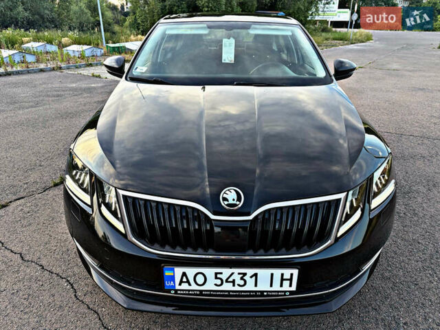 Черный Шкода Октавия, объемом двигателя 2.01 л и пробегом 165 тыс. км за 18550 $, фото 2 на Automoto.ua