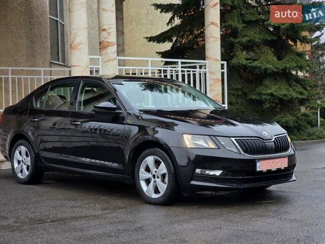 Чорний Шкода Октавія, об'ємом двигуна 2 л та пробігом 228 тис. км за 13999 $, фото 1 на Automoto.ua