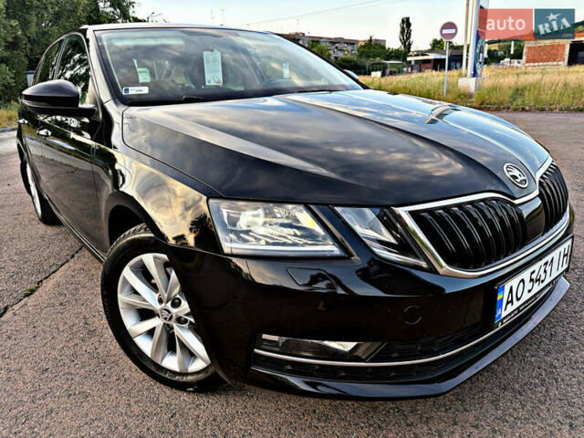 Черный Шкода Октавия, объемом двигателя 2.01 л и пробегом 165 тыс. км за 18550 $, фото 16 на Automoto.ua