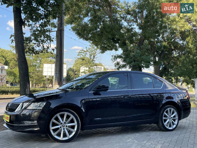 Чорний Шкода Октавія, об'ємом двигуна 2 л та пробігом 208 тис. км за 17999 $, фото 1 на Automoto.ua