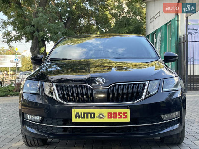 Чорний Шкода Октавія, об'ємом двигуна 2 л та пробігом 208 тис. км за 17999 $, фото 4 на Automoto.ua