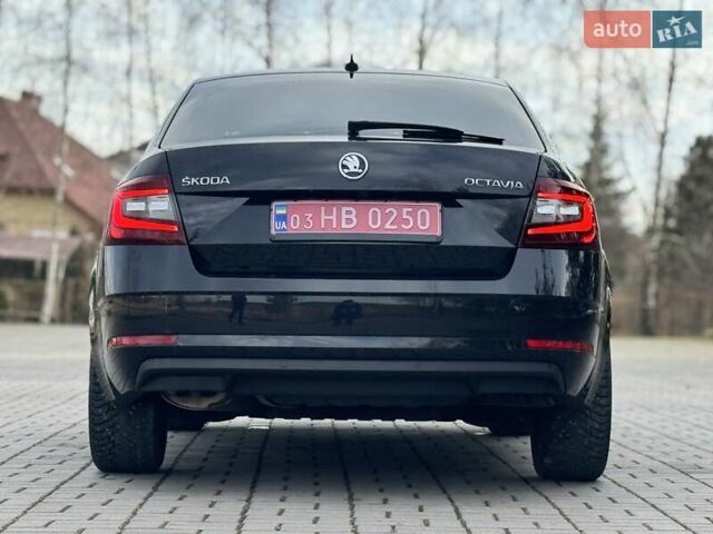 Черный Шкода Октавия, объемом двигателя 2 л и пробегом 124 тыс. км за 18900 $, фото 5 на Automoto.ua