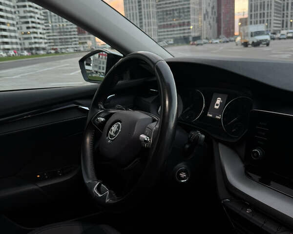 Черный Шкода Октавия, объемом двигателя 1.4 л и пробегом 170 тыс. км за 22500 $, фото 8 на Automoto.ua