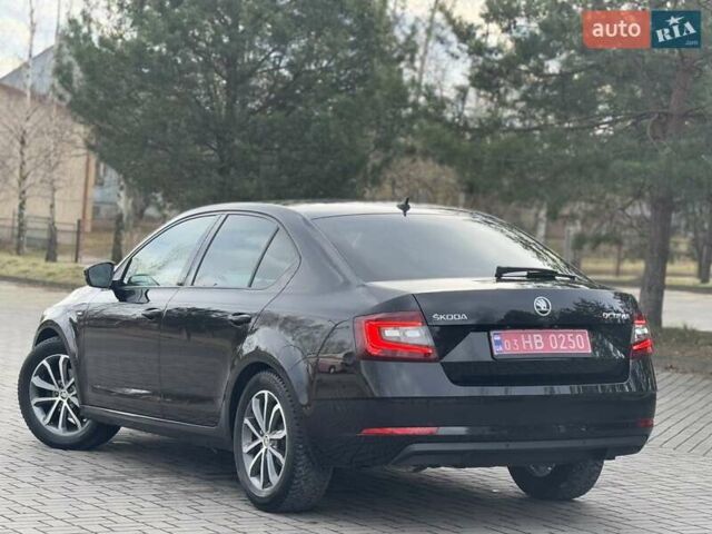 Черный Шкода Октавия, объемом двигателя 2 л и пробегом 124 тыс. км за 18900 $, фото 16 на Automoto.ua