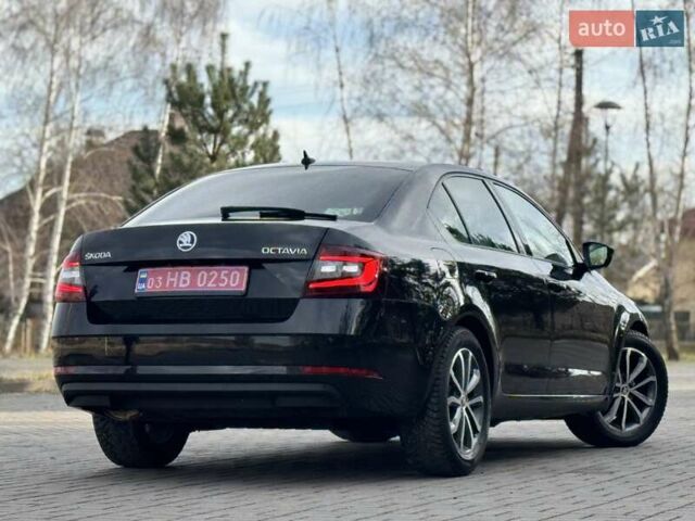 Черный Шкода Октавия, объемом двигателя 2 л и пробегом 124 тыс. км за 18900 $, фото 3 на Automoto.ua