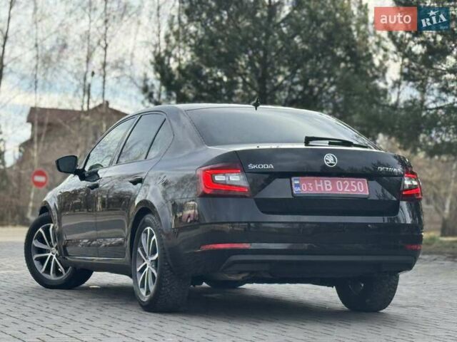 Черный Шкода Октавия, объемом двигателя 2 л и пробегом 124 тыс. км за 18900 $, фото 2 на Automoto.ua