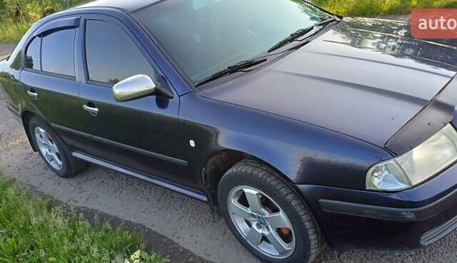 Фиолетовый Шкода Октавия, объемом двигателя 1.6 л и пробегом 305 тыс. км за 3500 $, фото 1 на Automoto.ua