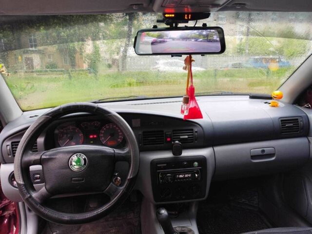 Красный Шкода Октавия, объемом двигателя 1.8 л и пробегом 367 тыс. км за 3400 $, фото 2 на Automoto.ua