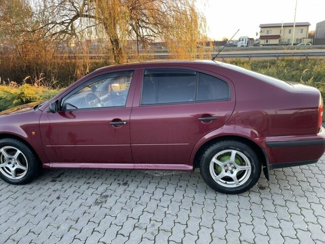 Красный Шкода Октавия, объемом двигателя 1.6 л и пробегом 280 тыс. км за 2650 $, фото 3 на Automoto.ua