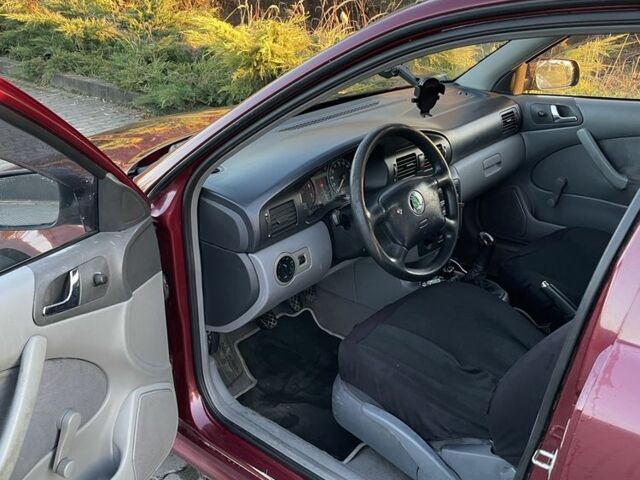 Красный Шкода Октавия, объемом двигателя 1.6 л и пробегом 280 тыс. км за 2650 $, фото 5 на Automoto.ua