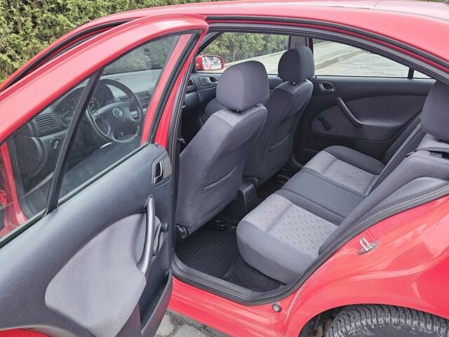 Красный Шкода Октавия, объемом двигателя 1.6 л и пробегом 227 тыс. км за 4999 $, фото 9 на Automoto.ua