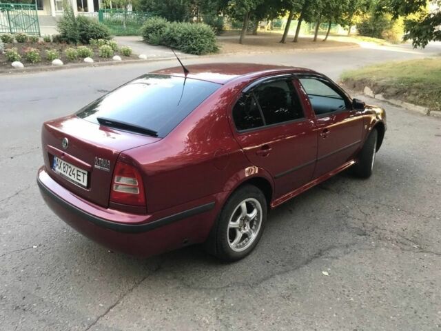 Красный Шкода Октавия, объемом двигателя 1.6 л и пробегом 300 тыс. км за 5000 $, фото 2 на Automoto.ua