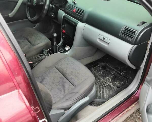 Красный Шкода Октавия, объемом двигателя 1.9 л и пробегом 366 тыс. км за 2499 $, фото 4 на Automoto.ua