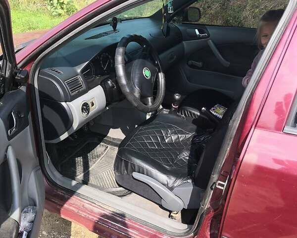 Красный Шкода Октавия, объемом двигателя 1.9 л и пробегом 366 тыс. км за 2499 $, фото 9 на Automoto.ua