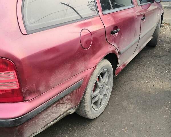 Красный Шкода Октавия, объемом двигателя 1.9 л и пробегом 366 тыс. км за 2499 $, фото 3 на Automoto.ua