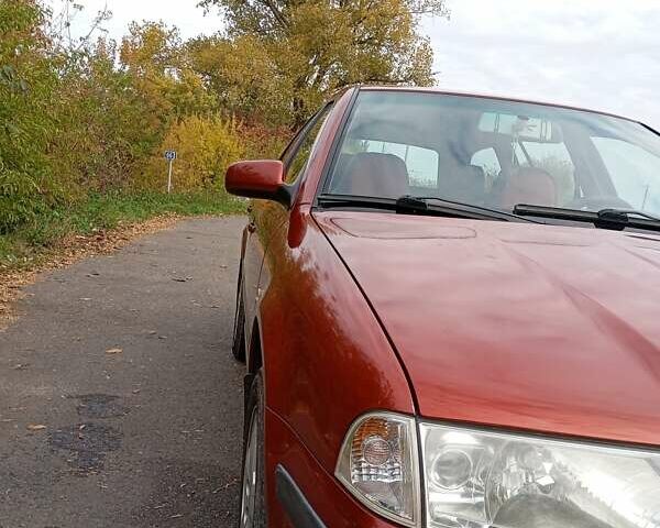 Красный Шкода Октавия, объемом двигателя 1.6 л и пробегом 282 тыс. км за 5100 $, фото 1 на Automoto.ua