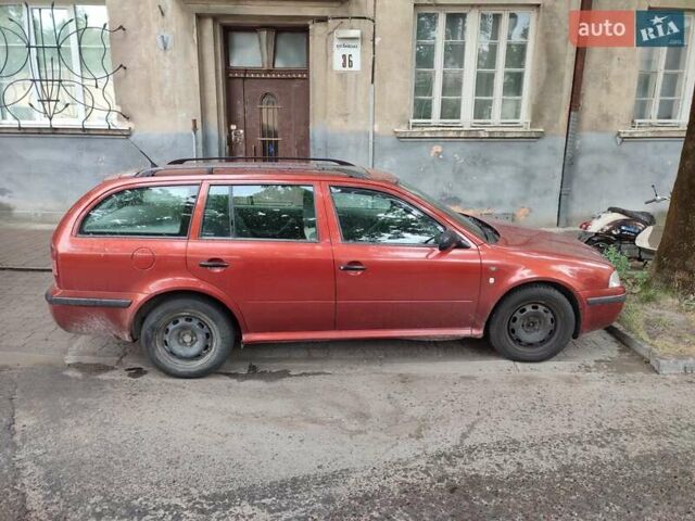 Красный Шкода Октавия, объемом двигателя 1.6 л и пробегом 327 тыс. км за 4250 $, фото 1 на Automoto.ua