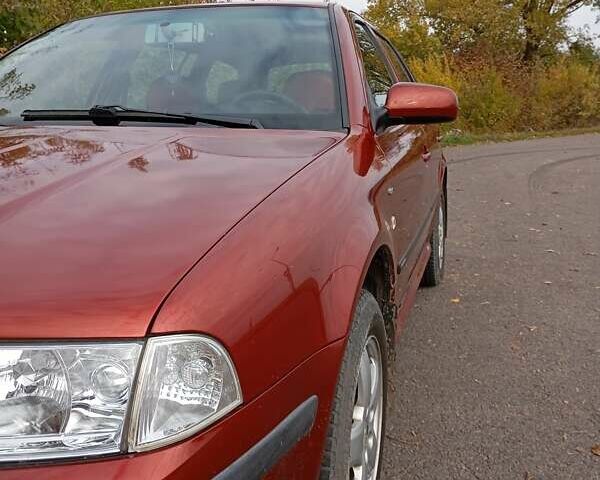 Красный Шкода Октавия, объемом двигателя 1.6 л и пробегом 282 тыс. км за 5100 $, фото 2 на Automoto.ua