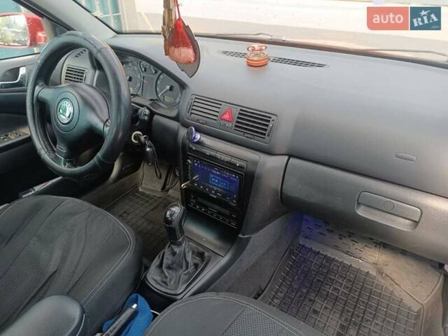 Красный Шкода Октавия, объемом двигателя 1.6 л и пробегом 224 тыс. км за 4800 $, фото 9 на Automoto.ua