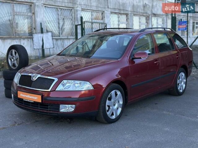 Красный Шкода Октавия, объемом двигателя 2 л и пробегом 206 тыс. км за 7900 $, фото 1 на Automoto.ua