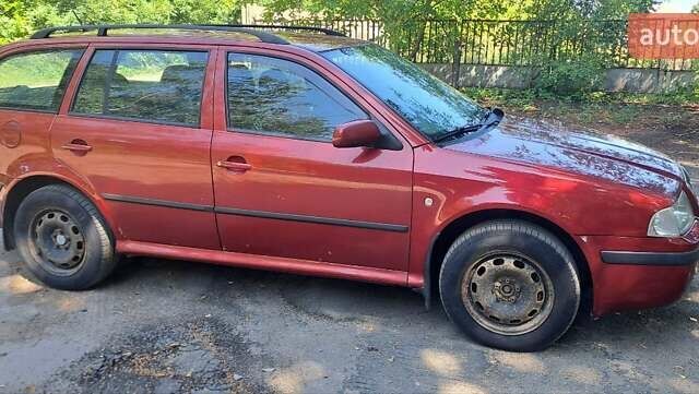 Красный Шкода Октавия, объемом двигателя 1.9 л и пробегом 599 тыс. км за 5099 $, фото 4 на Automoto.ua