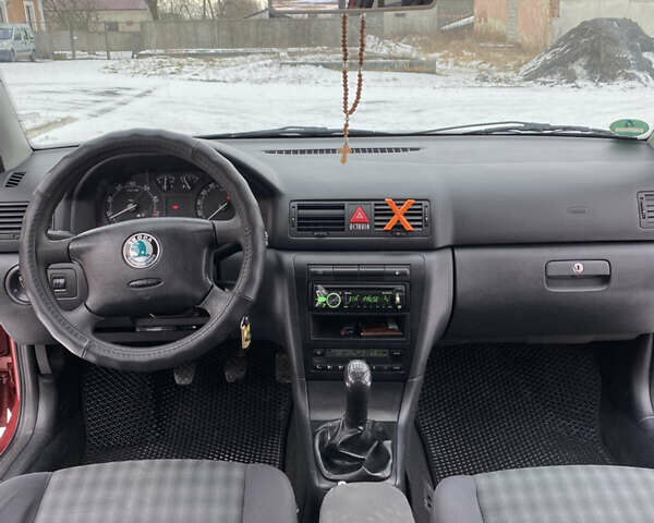 Красный Шкода Октавия, объемом двигателя 1.6 л и пробегом 122 тыс. км за 5800 $, фото 17 на Automoto.ua