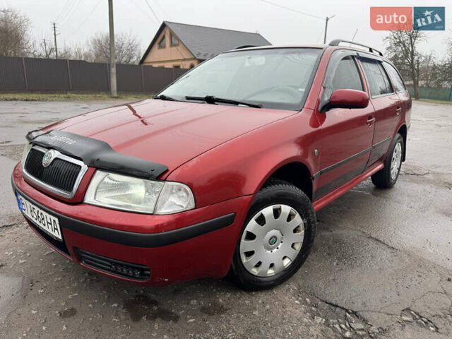 Красный Шкода Октавия, объемом двигателя 1.6 л и пробегом 316 тыс. км за 5980 $, фото 5 на Automoto.ua