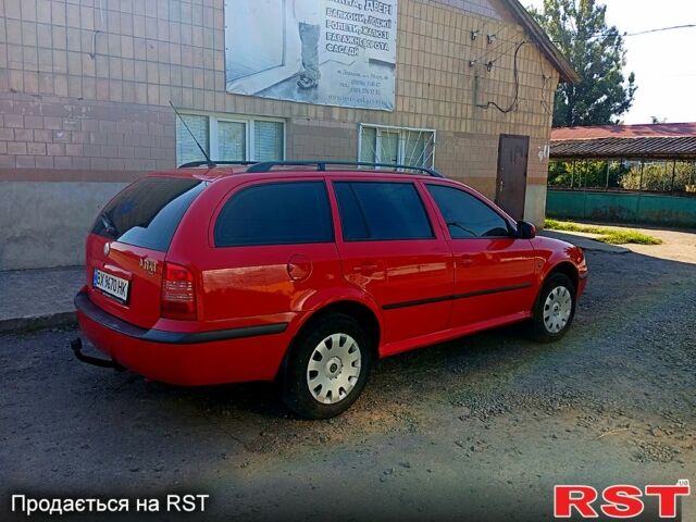Красный Шкода Октавия, объемом двигателя 1.6 л и пробегом 156 тыс. км за 6300 $, фото 1 на Automoto.ua