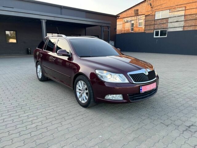 Красный Шкода Октавия, объемом двигателя 1.8 л и пробегом 128 тыс. км за 8190 $, фото 2 на Automoto.ua
