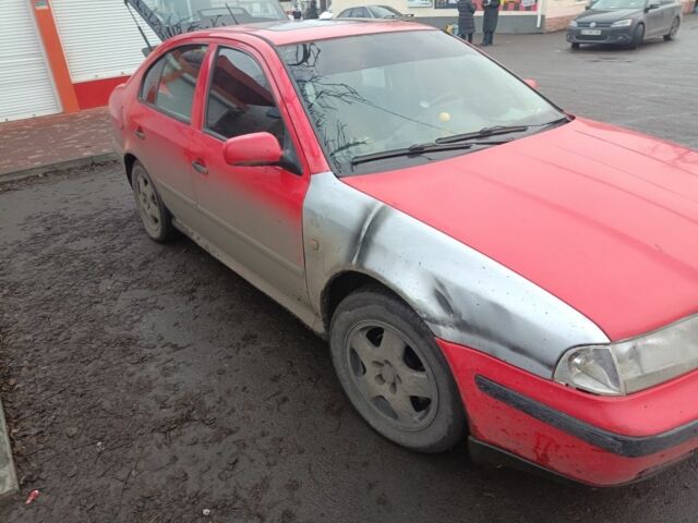 Красный Шкода Октавия, объемом двигателя 1.6 л и пробегом 397 тыс. км за 2500 $, фото 1 на Automoto.ua