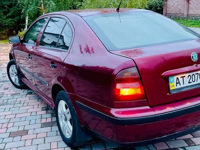 Красный Шкода Октавия, объемом двигателя 1.6 л и пробегом 300 тыс. км за 2650 $, фото 5 на Automoto.ua