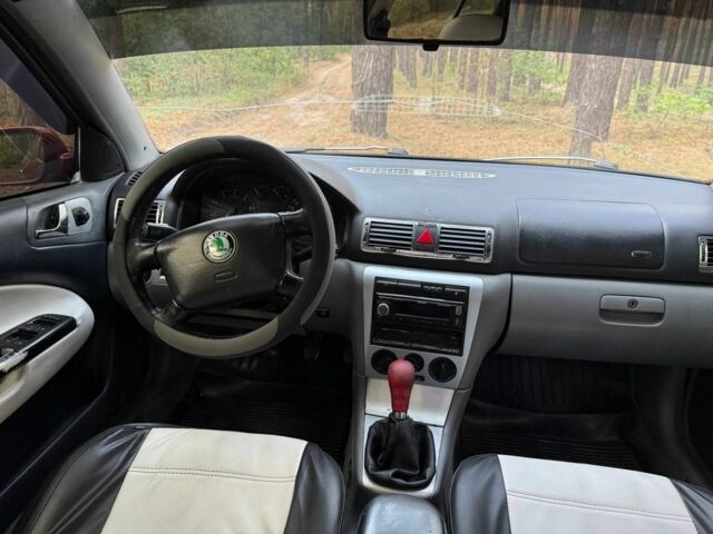 Красный Шкода Октавия, объемом двигателя 1.8 л и пробегом 390 тыс. км за 3200 $, фото 6 на Automoto.ua