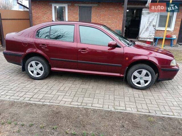 Красный Шкода Октавия, объемом двигателя 1.6 л и пробегом 330 тыс. км за 3600 $, фото 7 на Automoto.ua