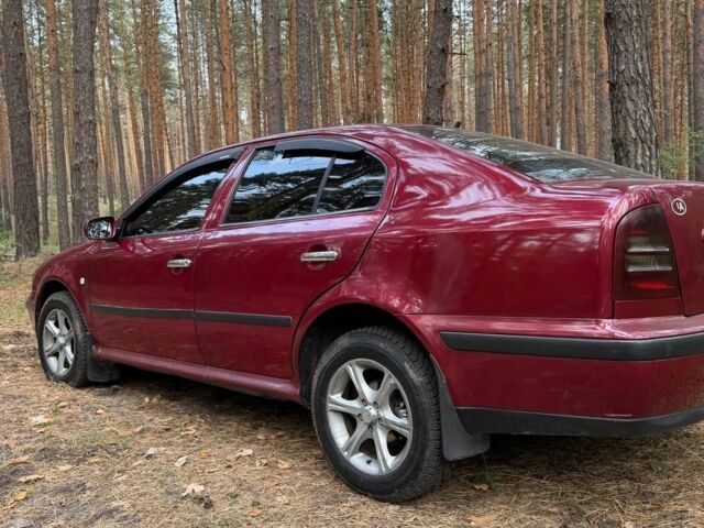 Красный Шкода Октавия, объемом двигателя 1.8 л и пробегом 390 тыс. км за 3200 $, фото 2 на Automoto.ua